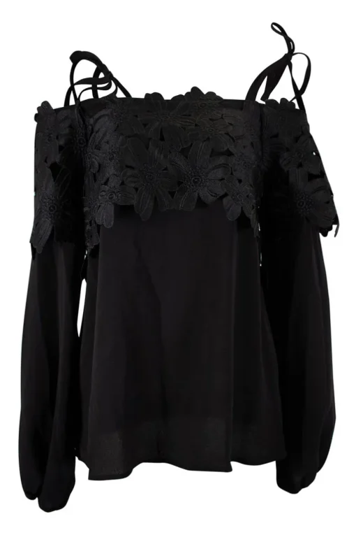 Black off-shoulder top with black flower applique chest flap