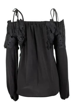Black off-shoulder top with black flower applique chest flap