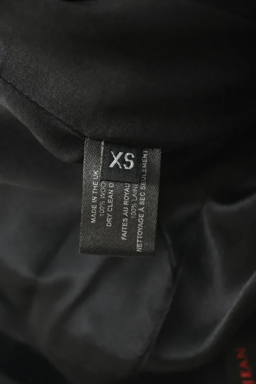 Black origami off-shoulder sheath dress with slanted hip pockets