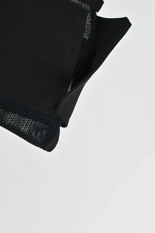 Black paneled nylon mesh peek-a-boo strapless zip-up corset top