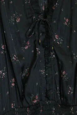 Black paneled polyester floral print plissé pullover smocked A-line sun dress with self-tie at neckline front