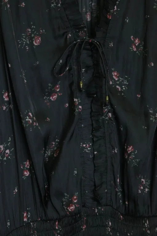 Black paneled polyester floral print plissé pullover smocked A-line sun dress with self-tie at neckline front