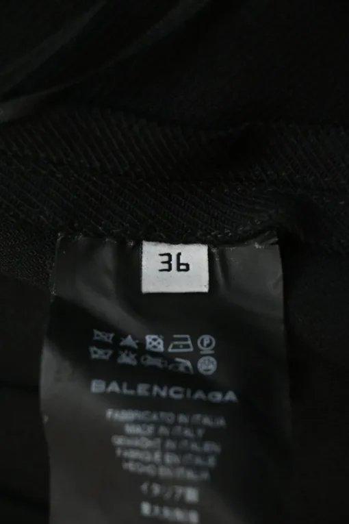 Black polyamide-blend pull-on wrap-effect apron-style knee-length skirt