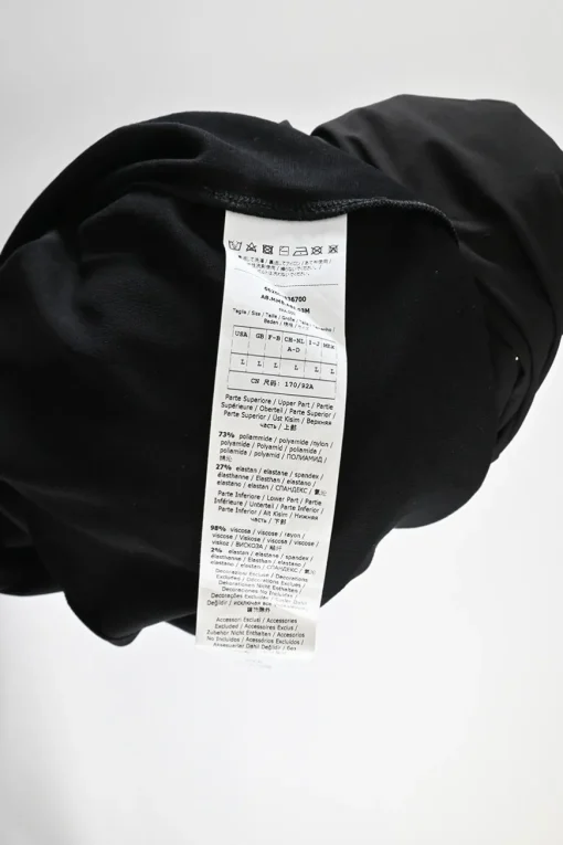 Black polyamide-blend wrap-effect polka dot blouson sheath dress with adjustable leather buckle belt