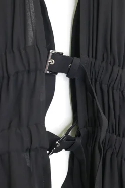 Black polyester draped buckle front harness dress overlay