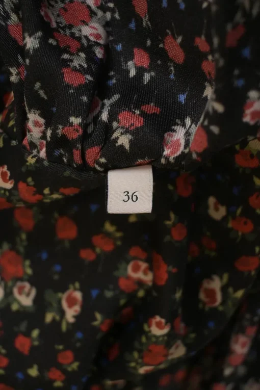 Black polyester floral ditsy print empire-waist button-front A-line midi dress with bishop sleeves