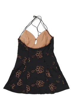 Black polyester keyhole-front Renee peekaboo halter criss-cross back skater dress featuring rose motif