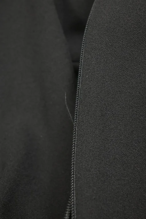 Black polyester-blend mixed-media turtleneck sheath dress with cascade draped hip sash appliqué