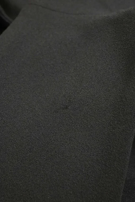 Black polyester-blend mixed-media turtleneck sheath dress with cascade draped hip sash appliqué