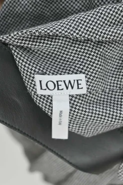 Black polyester-blend pinwheel houndstooth knot-back shirt dress with rounded leather dagger collar