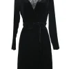 Black rayon-blend velvet long sleeve wrap A-line mini dress with self-tie fastening at waist