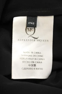 Black semi-sheer polyester georgette band collar button-front shirtdress with leather ruffle hem