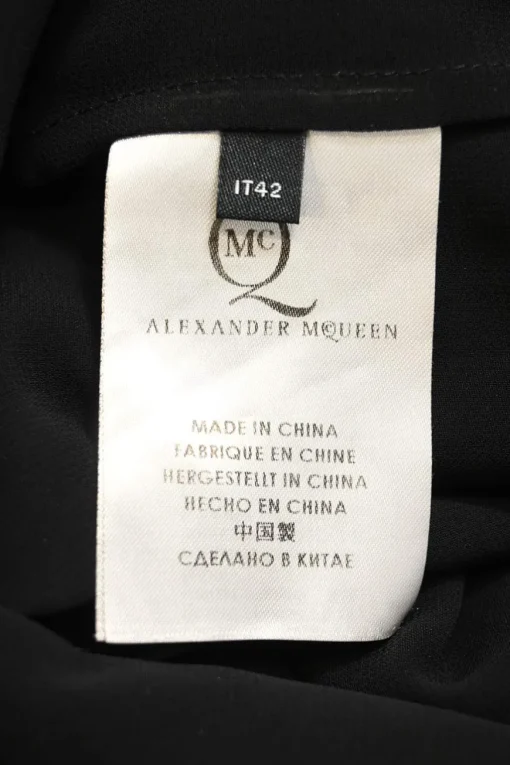 Black semi-sheer polyester georgette band collar button-front shirtdress with leather ruffle hem
