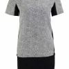 Black short sleeve shift dress with panel of off-white and black metallic fabric