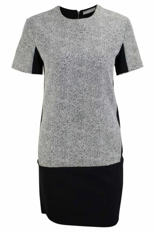 Black short sleeve shift dress with panel of off-white and black metallic fabric