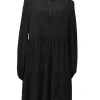 Black silk band collar half-button long sleeve tiered shift dress with metallic button loop fastening