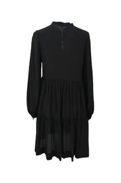 Black silk band collar half-button long sleeve tiered shift dress with metallic button loop fastening