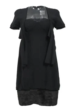 Black silk bi-layer effect tie-front empire waist bubble dress with raw-edge tulip sleeves and fur-trimmed skirt
