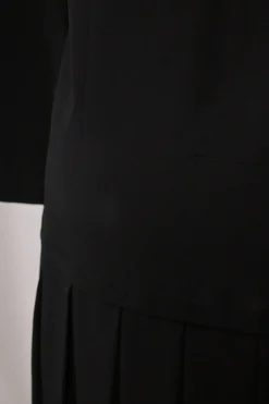 Black silk portrait neck drop-waist shift dress with knife-pleat skirt