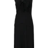 Black silk sleeveless sheath dress with frill collar and bib