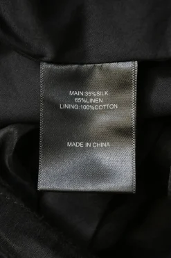 Black silk-linen blend Mimosa balloon sleeve tie-waist mini dress with gathered neckline and cutout back