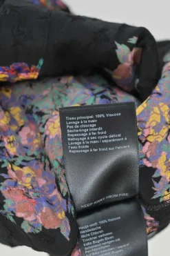 Black viscose floral print raglan sleeve button-front blouse with classic collar