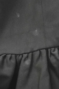 Black viscose-blend high-collar flutter sleeve tulip skirt mini dress featuring built-in chainlink necklace appliqué