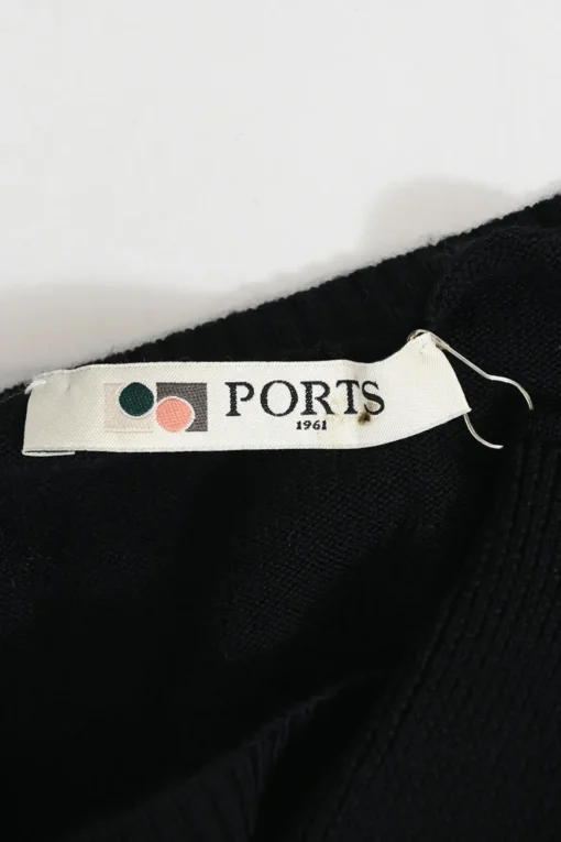 Black wool floating turtleneck sweater with detachable Dickey collar and sleeves