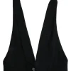 Black wool halterneck waistcoat with self-tie fastening at mid-back