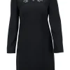 Black wool long sleeve mini dress with emerald and crystal stone embellishment around neckline, double pleated bodice for figure fit.