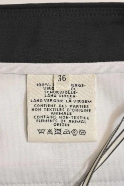 Black wool wrap-front apron-style tailored culotte skort with button-front fastening