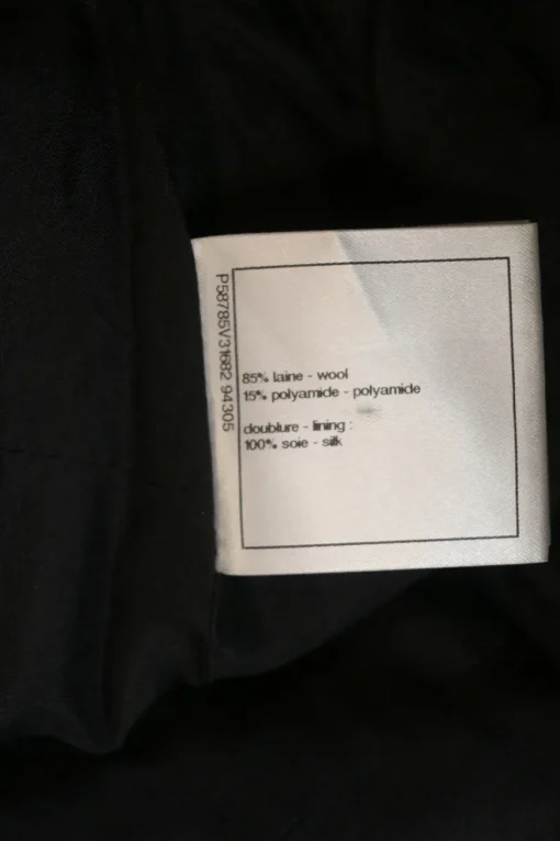 Black wool-blend pull-on empire-waist knee-length skirt