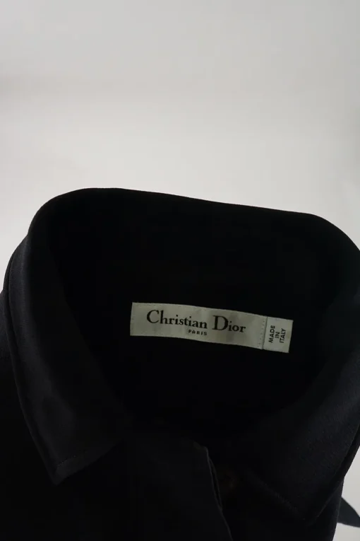 Black wool-silk blend point collar short sleeve safari-style A-line dress with signature slanted hip pockets