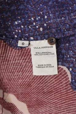 Blue and burgundy cotton abstract print Caasi crewneck pullover blouson sleeve top with flutter appliqué and keyhole back