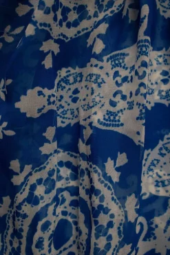 Blue and white print sheer embellished mini dress