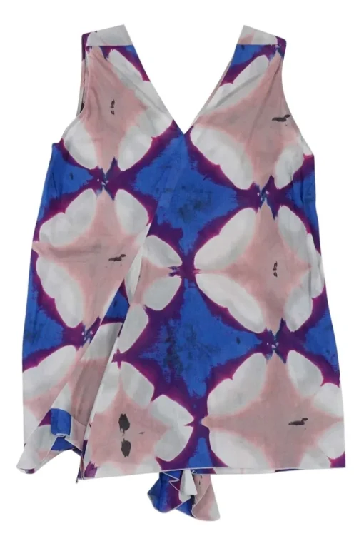 Blue bias-cut cotton abstract batik print plunge neck swing top with cascade ruffle trim at centre front