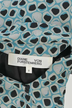 Blue silk abstract print point collar swing-style bubble shirt with drawstring hem