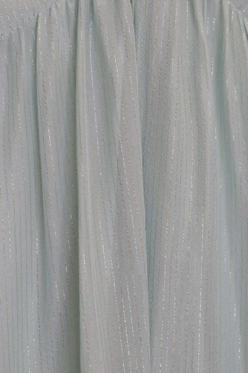 Blue silk metallic striped slip dress with high-low hem, smocked back, and adjustable spaghetti straps