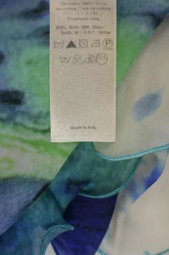 Blue smocked silk abstract digi-print slip dress with asymmetric lettuce hem