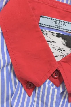 Blue stripe cotton poplin sleeveless button-front shirt featuring contrasting Oxford collar and 'Girls Invented' comic motif