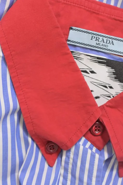 Blue stripe cotton poplin sleeveless button-front shirt featuring contrasting Oxford collar and 'Girls Invented' comic motif