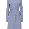 Blue striped chambray point collar button-front utility shirt dress featuring chest and hip patch pockets and elasticated waist