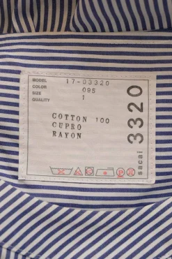 Blue striped cotton poplin cap sleeve swing-style blouse with tiered plissé hem insert