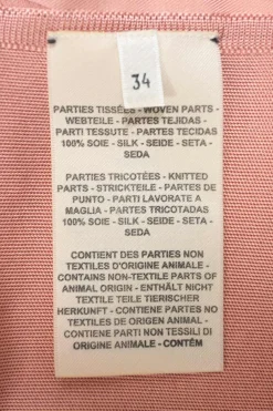 Blush and red silk 'Étude Pour Une Parure De Gala' Twillaine cardigan featuring original artwork by Florence Manlik
