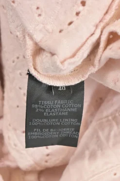 Blush pink cotton-blend broderie anglaise tiered ruffle mini-skirt