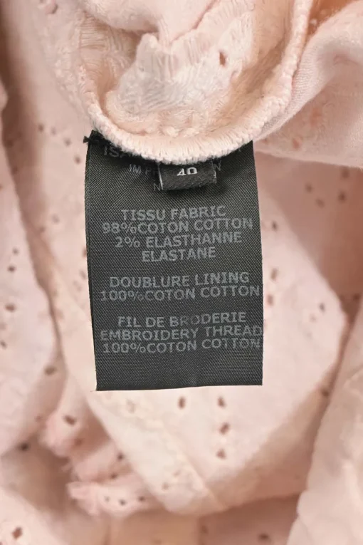 Blush pink cotton-blend broderie anglaise tiered ruffle mini-skirt