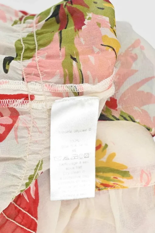 Blush semi-sheer crinkle silk floral print swing-style camisole with fixed criss-cross straps
