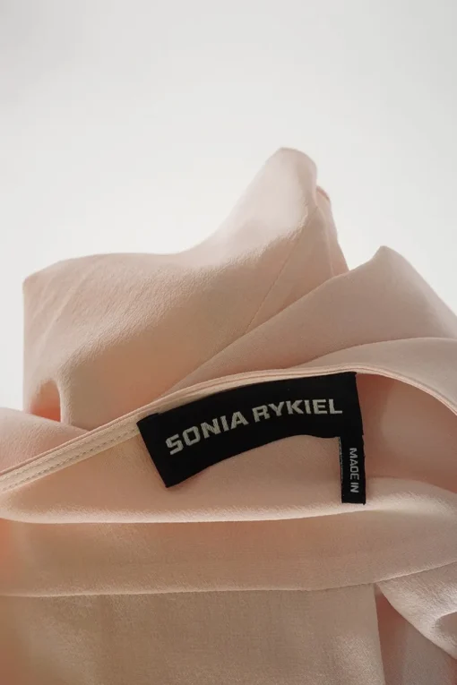 Blush silk crêpe long sleeve blouse with pleated front and blouson sleeve cuffs