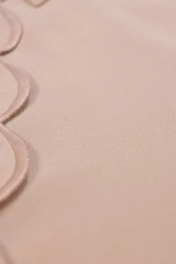 Blush silk spread collar button-front shirt with scalloped placket