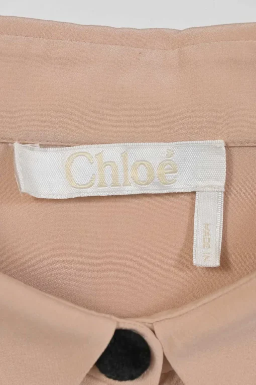 Blush silk spread collar button-front shirt with scalloped placket